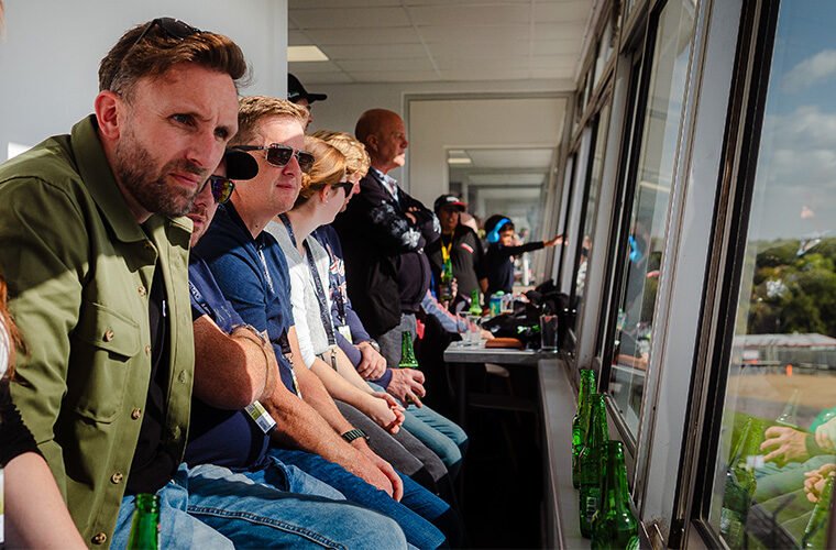 GSF Car Parts hosts VIP customer day at Porsche Sprint Challenge finale 1 GSF customers enjoy Gold Hopsitality trackside views garage wire